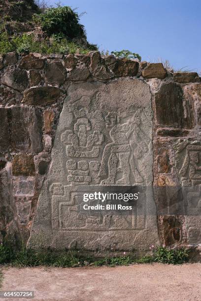 detail showing figure from sculptural program at monte alban - zapotec people stock pictures, royalty-free photos & images