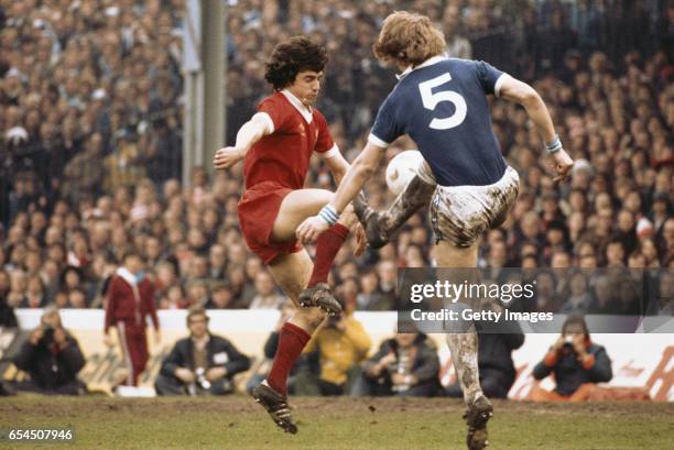 Liverpool striker Kevin Keegan challenges Ken McNaught of Everton during the FA Cup semi final which finished 2-2 at Maine Road, Manchester on April...