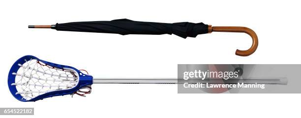 umbrella and a lacrosse stick - crosier stock pictures, royalty-free photos & images