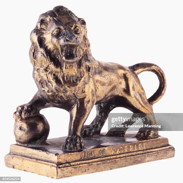 paperweight of lion of waterloo monument - paperweight stock pictures, royalty-free photos & images