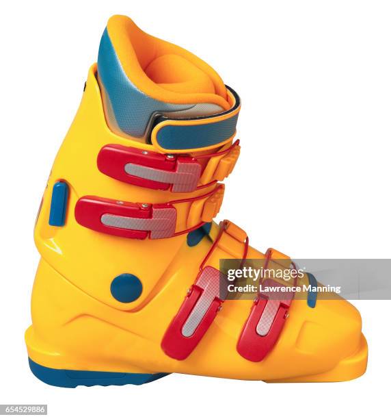 close-up of a yellow ski boot - skischoen stockfoto's en -beelden