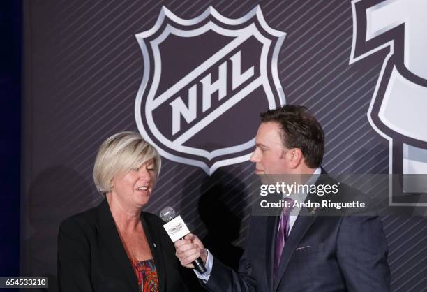 Scotiabank SVP Carole Chapdelaine speaks with media personality Elliotte Friedman during the 2017 Scotiabank NHL 100 Classic announcement at the...