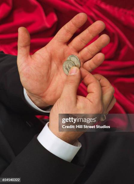 149 Magic Trick Coin Stock Photos, High-Res Pictures, and Images ...