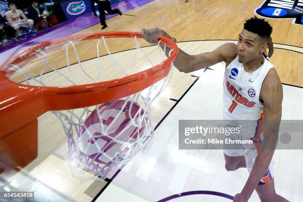 Devin Robinson of the Florida Gators dunks the ball against the East Tennessee State Buccaneers during the first round of the 2017 NCAA Men's...