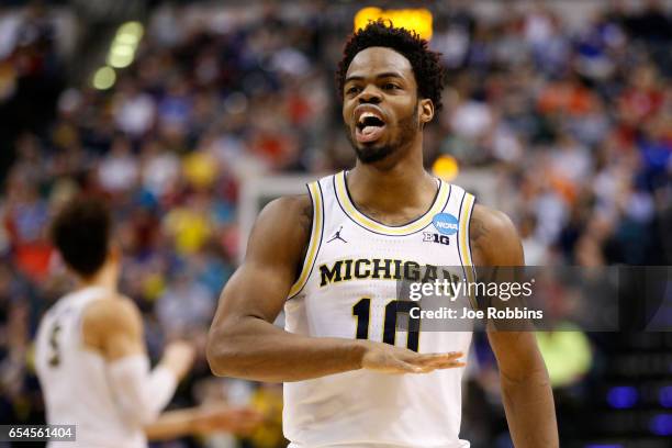 Derrick Walton Jr. #10 of the Michigan Wolverines reacts against the Oklahoma State Cowboys during the first round of the 2017 NCAA Men's Basketball...