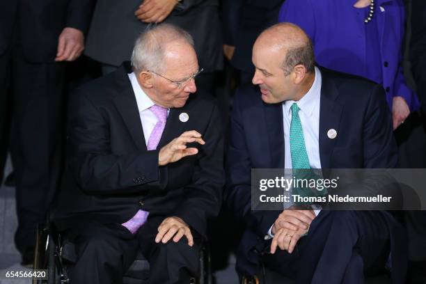 German Finance Minister Wolfgang Schaeuble talks to Federico Sturzenegger, president of the Central Bank of Argentina during the family photo during...