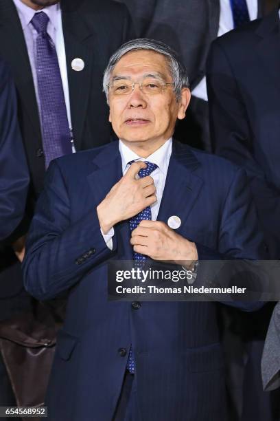 Governor of the Bank of Japan Haruhiko Kuroda attends the family photo during the G20 finance ministers meeting on March 17, 2017 in Baden-Baden,...