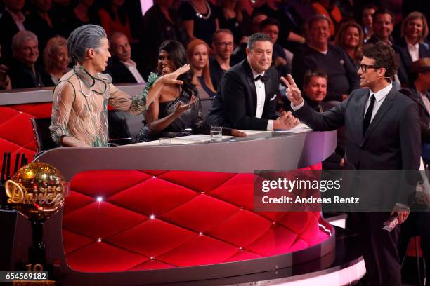 Members of the jury Jorge Gonzalez, Motsi Mabuse and Joachim Llambi talk to host Daniel Hartwig on stage during the 1st show of the tenth season of...