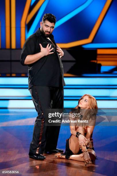 Faisal Kawusi and Oana Nechiti perform on stage during the 1st show of the tenth season of the television competition 'Let's Dance' on March 17, 2017...