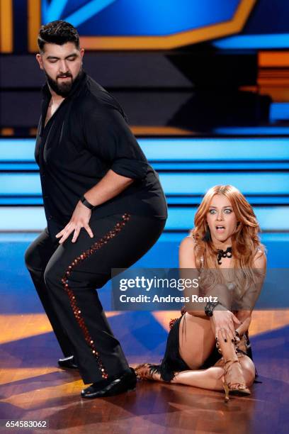 Faisal Kawusi and Oana Nechiti perform on stage during the 1st show of the tenth season of the television competition 'Let's Dance' on March 17, 2017...