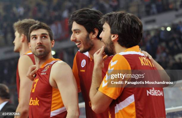 Players of Galatasaray celebrate theri victory during the 2016/2017 Turkish Airlines EuroLeague Regular Season Round 26 game between Olympiacos...