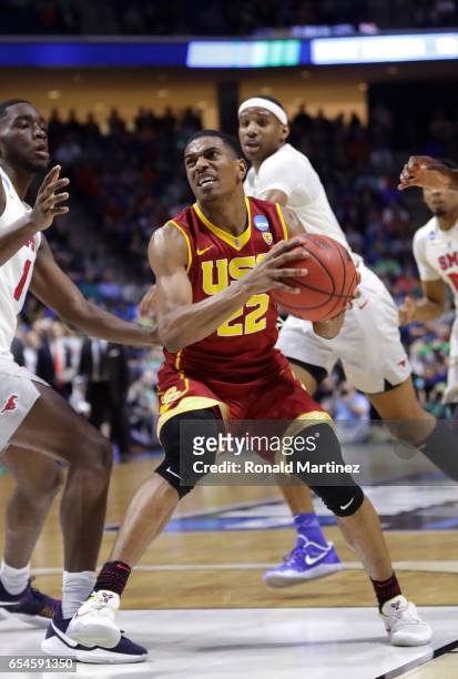 De'Anthony Melton of the USC Trojans handles the ball in the second half against the Southern Methodist Mustangs during the first round of the 2017...