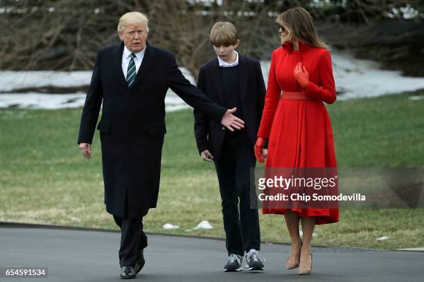 President Donald Trump, first lady Melania Trump and their son Barron Trump depart the White House March 17, 2017 in Washington, DC. The first family...