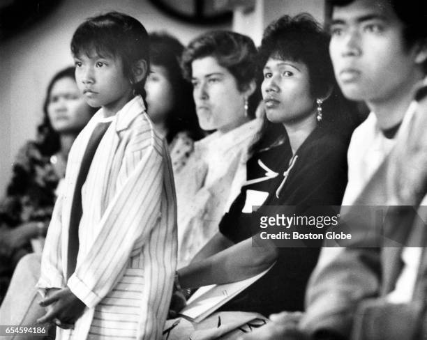 Members of the audience listen to Mayor Robert Kennedy speak at meeting with Lowell parents concerning a segregation problem in the city because of...