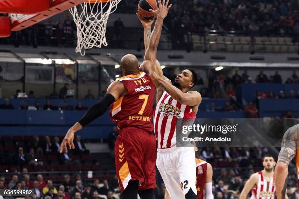 Alex Tyus of Galatasaray Odebank in action against Khem Birch of Olympiacos Piraeus during the Turkish Airlines Euroleague Basketball match between...