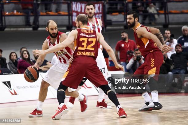 Sinan Guler of Galatasary Odebank in action against Vassilis Spanoulis of Olympiacos Piraeus during the Turkish Airlines Euroleague Basketball match...