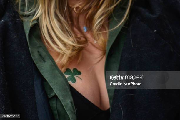 People celebrate St Patrick's Day 2017 during the parade in Dublin's city center. This year edition of St Patrick's Festival takes place from March...