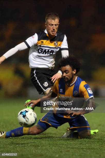 Ryan Taylor of Port Vale and Junior Brown of Shrewsbury Town during the Sky Bet League One match between Port Vale and Shrewsbury Town at Vale Park...