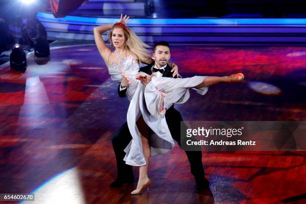 Cheyenne Pahde and Andrzej Cibis perform on stage during the 1st show of the tenth season of the television competition 'Let's Dance' on March 17,...