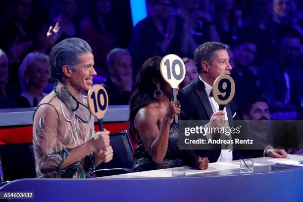 Members of the jury Jorge Gonzalez, Motsi Mabuse and Joachim Llambi gives 29 points to Vanessa Mai and Christian Polanc during the 1st show of the...