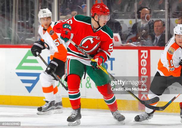 Blake Pietila of the New Jersey Devils in action against the Philadelphia Flyers on March 16, 2017 at Prudential Center in Newark, New Jersey. The...