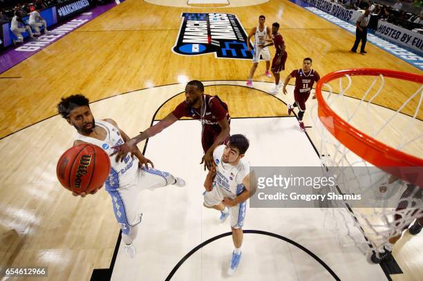 Joel Berry II of the North Carolina Tar Heels goes up for a shot against Marvin Jones of the Texas Southern Tigers in the second half during the...
