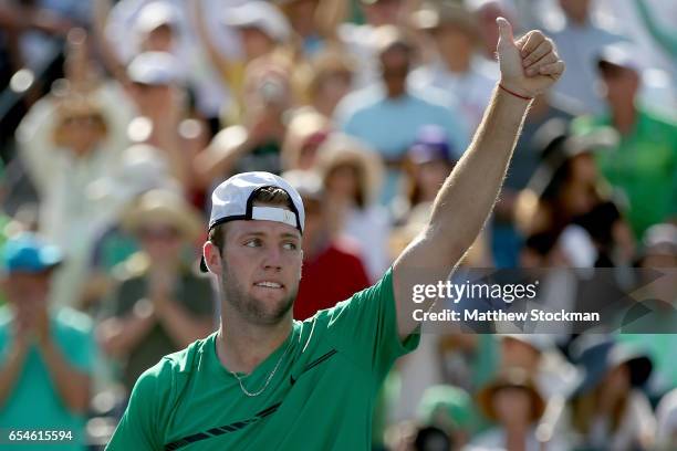 Jack Sock celebrates his win over Kei Nishikori of Japan during the quarterfinals of the BNP Paribas Open at the Indian Wells Tennis Garden on March...