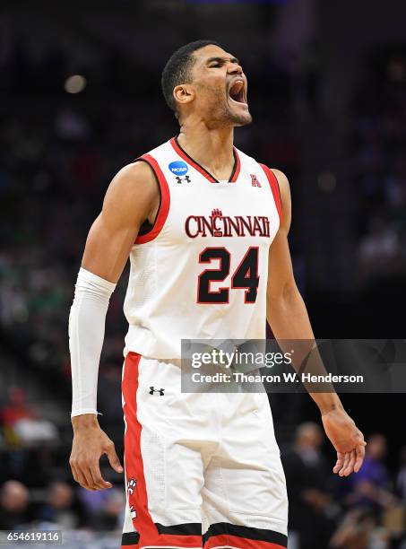 Kyle Washington of the Cincinnati Bearcats celebrates the play against the Kansas State Wildcats during the first round of the 2017 NCAA Men's...