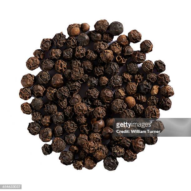 black peppercorns in a circle - black pepper stock pictures, royalty-free photos & images