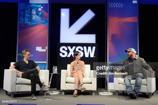 Steve Bloom and Hannah Karp talk with Garth Brooks during the SxSW Music Festival at the Austin Convention Center on March 17, 2017 in Austin, Texas.