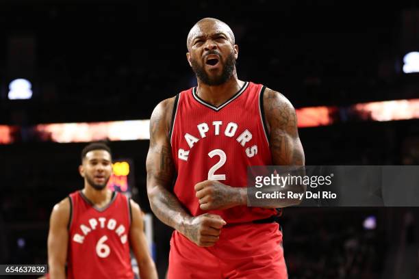 Tucker of the Toronto Raptors celebrates after a Detroit Pistons turnover late in the in the second half at the Palace of Auburn Hills on March 17,...