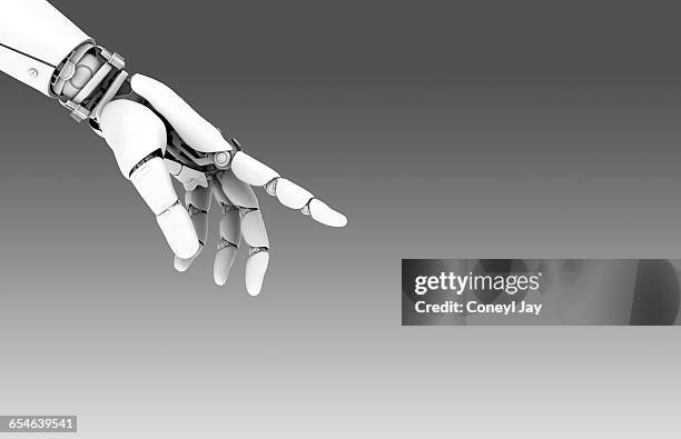robot hand pointing - industrial robotics stock pictures, royalty-free photos & images