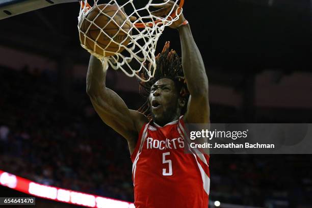 Montrezl Harrell of the Houston Rockets dunks the ball during the second half of a game against the New Orleans Pelicans at Smoothie King Center on...