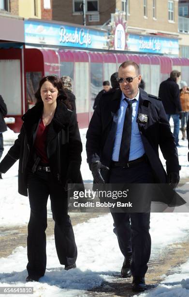 Marisa Ramirez and Donnie Wahlberg are seen filming are seen filming on the set of "Blue Bloods" on March 17, 2017 in Brooklyn.