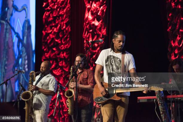 Joseph Woullard, Jason Frey and Joe Lewis of Black Joe Lewis & The Honeybears perform live on the Radio Day Stage during the SxSW Music Festival at...