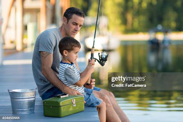 family spending day outdoors together - fishing tackle box stock pictures, royalty-free photos & images