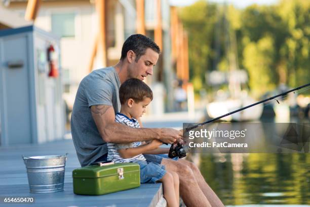 family spending day outdoors together - fishing tackle box stock pictures, royalty-free photos & images
