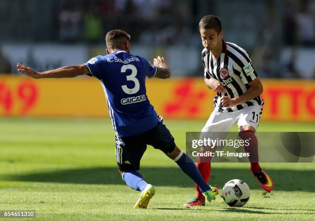 Junior Caicara of Schalke and Mijat Gacinovic of Frankfurt battle for the ball during the Bundesliga match between Eintracht Frankfurt and FC Schalke...
