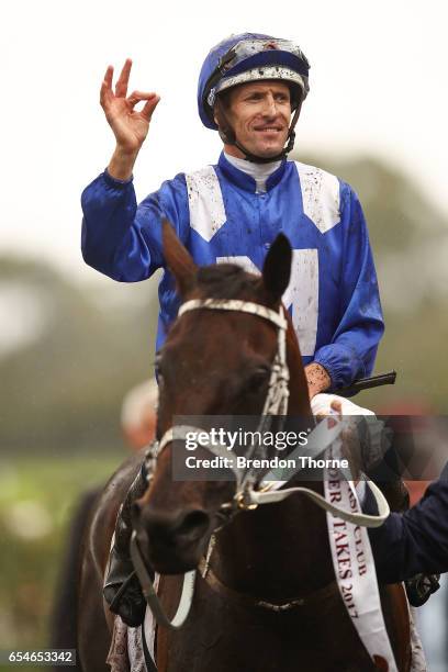 Hugh Bowman riding 'Winx' celebrates after winning Race 5, China Horse Club George Ryder during 2017 Golden Slipper Day at Rosehill Gardens on March...