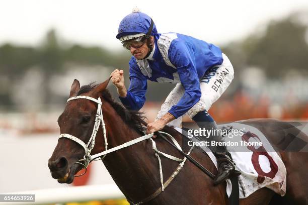 Hugh Bowman riding 'Winx' celebrates after winning Race 5, China Horse Club George Ryder during 2017 Golden Slipper Day at Rosehill Gardens on March...