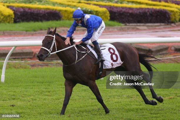 Hugh Bowman riding Winx celebrates winning Race 5 in the China Horse Club George Ryder during 2017 Golden Slipper Day at Rosehill Gardens on March...