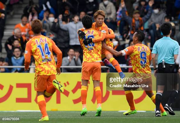 Shota Kaneko of Shimizu S-Pulse celebrates scoring the opening goal with his team mates during the J.League J1 match between Shimizu S-Pulse and...