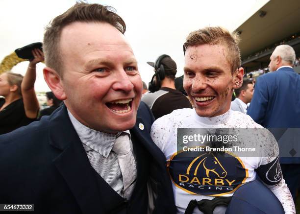 Ben Melham riding 'She Will Reign' celebrates with Scott Darby after winning Race 7, Longines Golden Slipper during 2017 Golden Slipper Day at...
