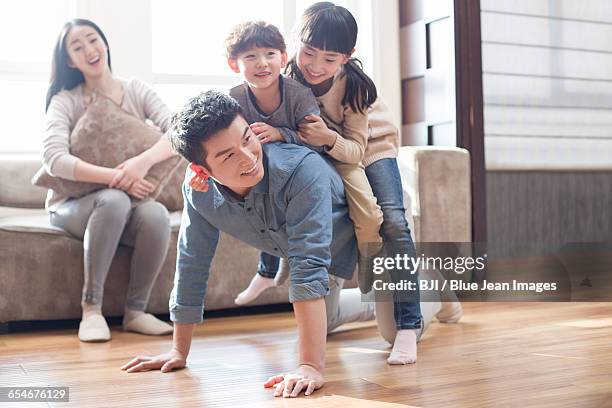 happy young family - family with two children stock pictures, royalty-free photos & images