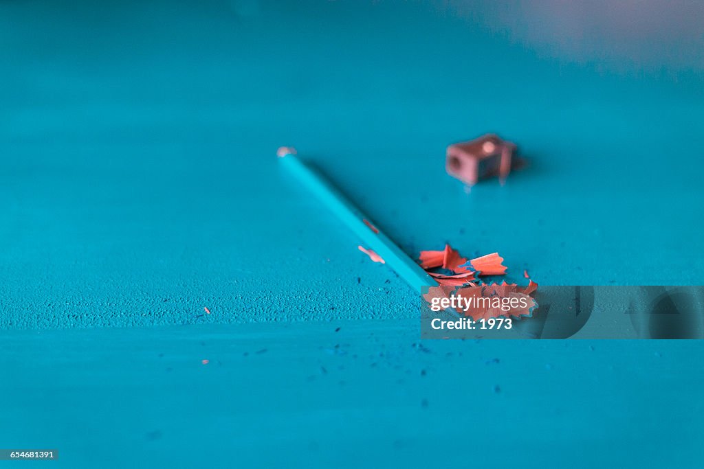 Blue pencil and pencil sharpener