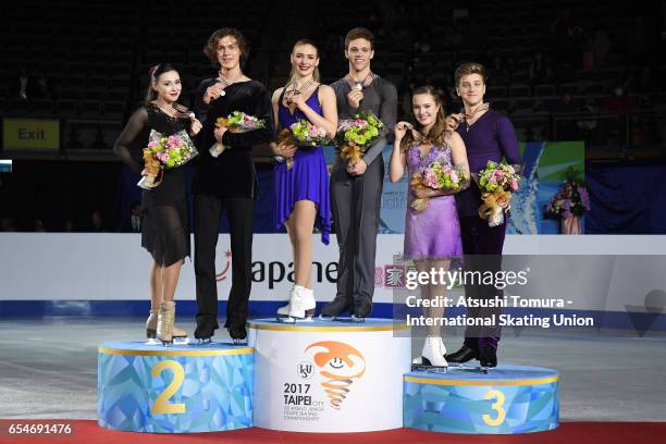 Alla Loboda and Pavel Drozd of Russia , Rachel Parsons and Michael Parsons of the USA , Christina Carreira and Anthony Ponomarenko of the USA pose...