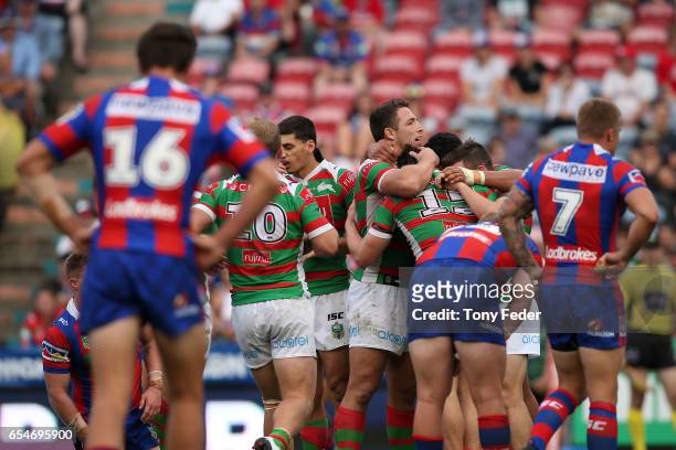 Rabbitohs players celebrate during the round three NRL match between the Newcastle Knights and the South Sydney Rabbitohs at McDonald Jones Stadium...