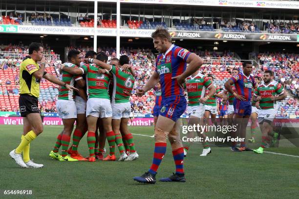 Rabbitohs players celebrte during the round three NRL match between the Newcastle Knights and the South Sydney Rabbitohs at McDonald Jones Stadium on...