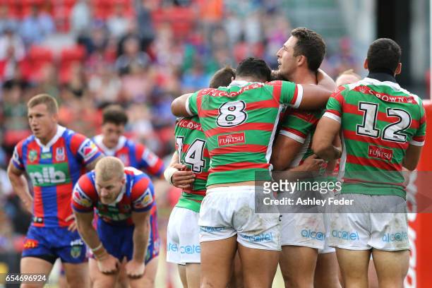 Rabbitohs players celebrte during the round three NRL match between the Newcastle Knights and the South Sydney Rabbitohs at McDonald Jones Stadium on...