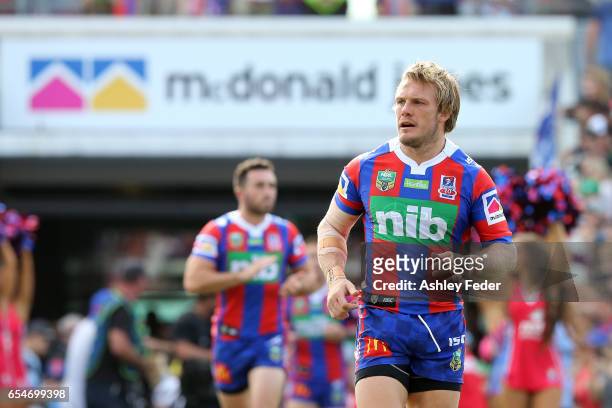 Nathan Ross of the Knights runs on to the ground during the round three NRL match between the Newcastle Knights and the South Sydney Rabbitohs at...